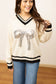 Silver Sequin Bow Sweater